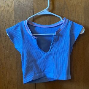 Go for gold Urban Outfitters seamless top! Size XS. Never worn!